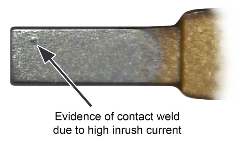 Evidence of contact weld due to high inrush current when hot switching power supplies